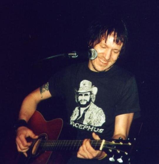 Elliott Smith – “Between the Bars” (image credits: wikimedia)