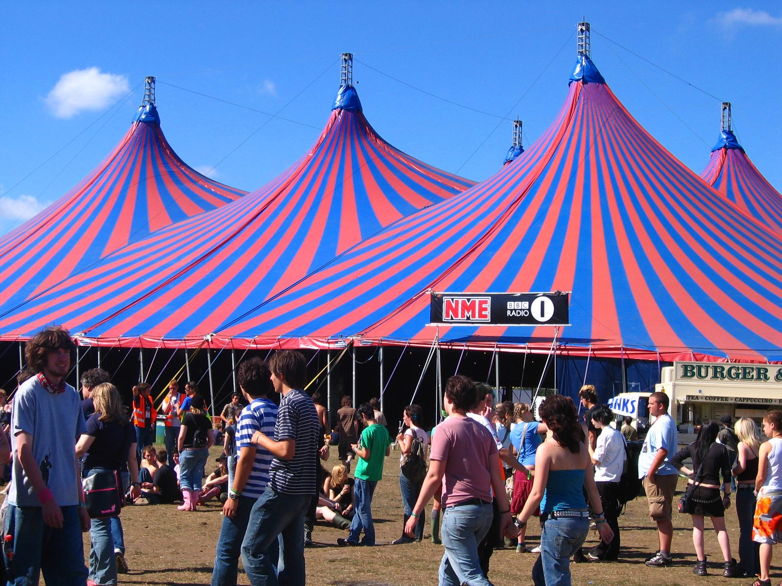 4. At which festival do you see fans crowd surfing in inflatable boats across a muddy field? (image credits: wikimedia)