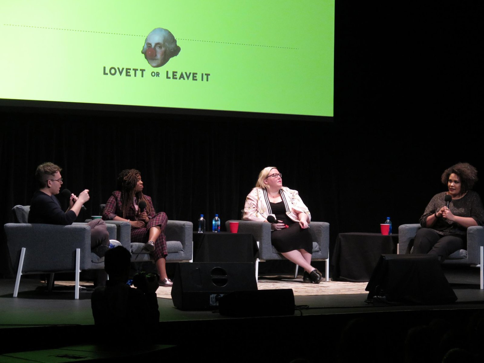 Political Satire in Podcasts (image credits: Lovett Or Leave It - Seattle - Crooked Media, CC BY-SA 2.0, https://commons.wikimedia.org/w/index.php?curid=66226808)