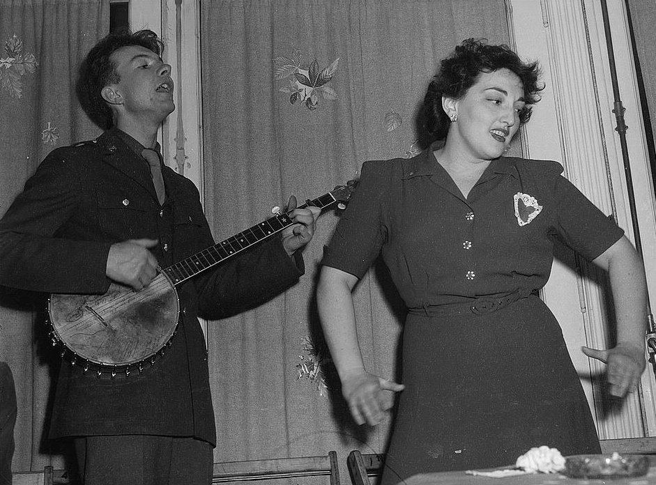 4. "We Shall Overcome" - Pete Seeger (popularized, 1963) (By FSA/OWI, Public domain)