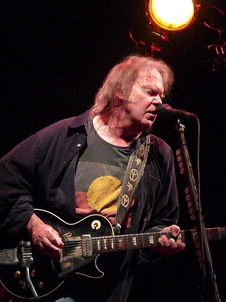 10. "The Needle and the Damage Done" – Neil Young (1972): A Two-Minute Elegy for a Lost Friend (By Andy Roo (6tee-zeven), CC BY 2.0)
