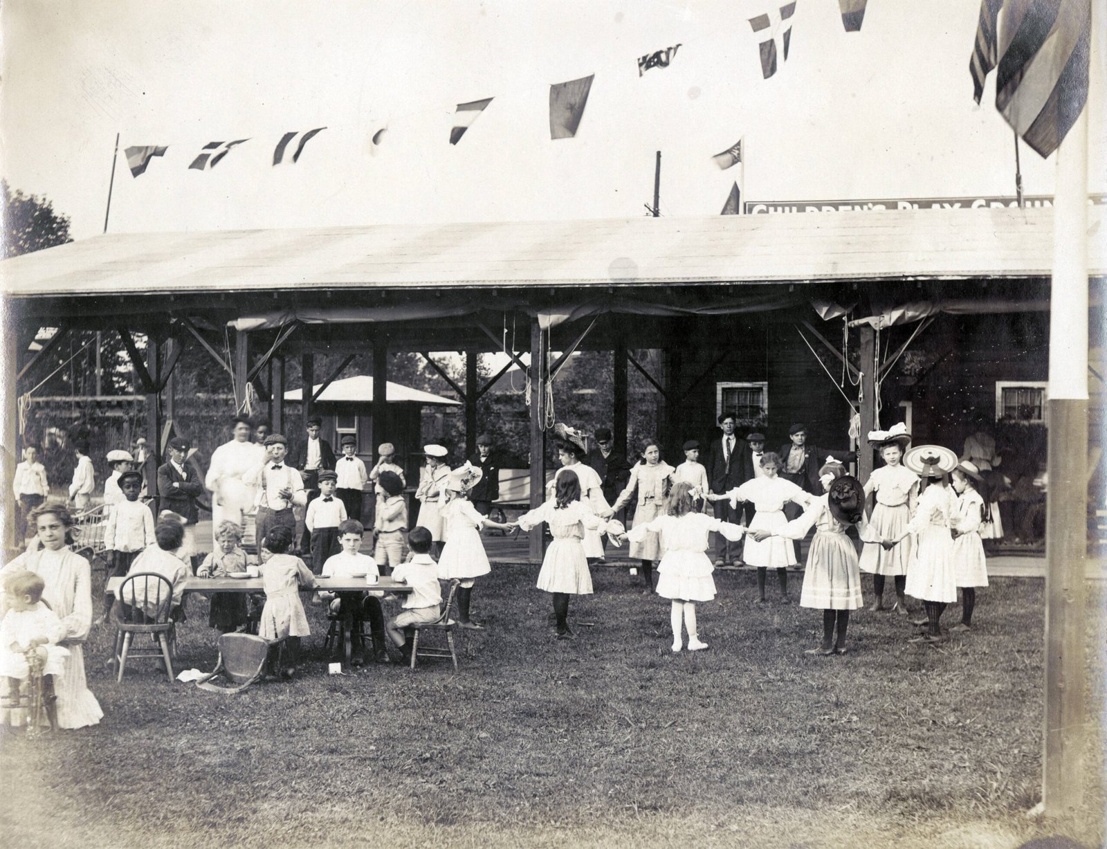 Ring Around the Rosie (Missouri History MuseumURL: http://images.mohistory.org/image/D6FB7C9E-4EB9-3CF4-51C4-3FC754BF1B31/original.jpgGallery: http://collections.mohistory.org/resource/147925, Public domain)