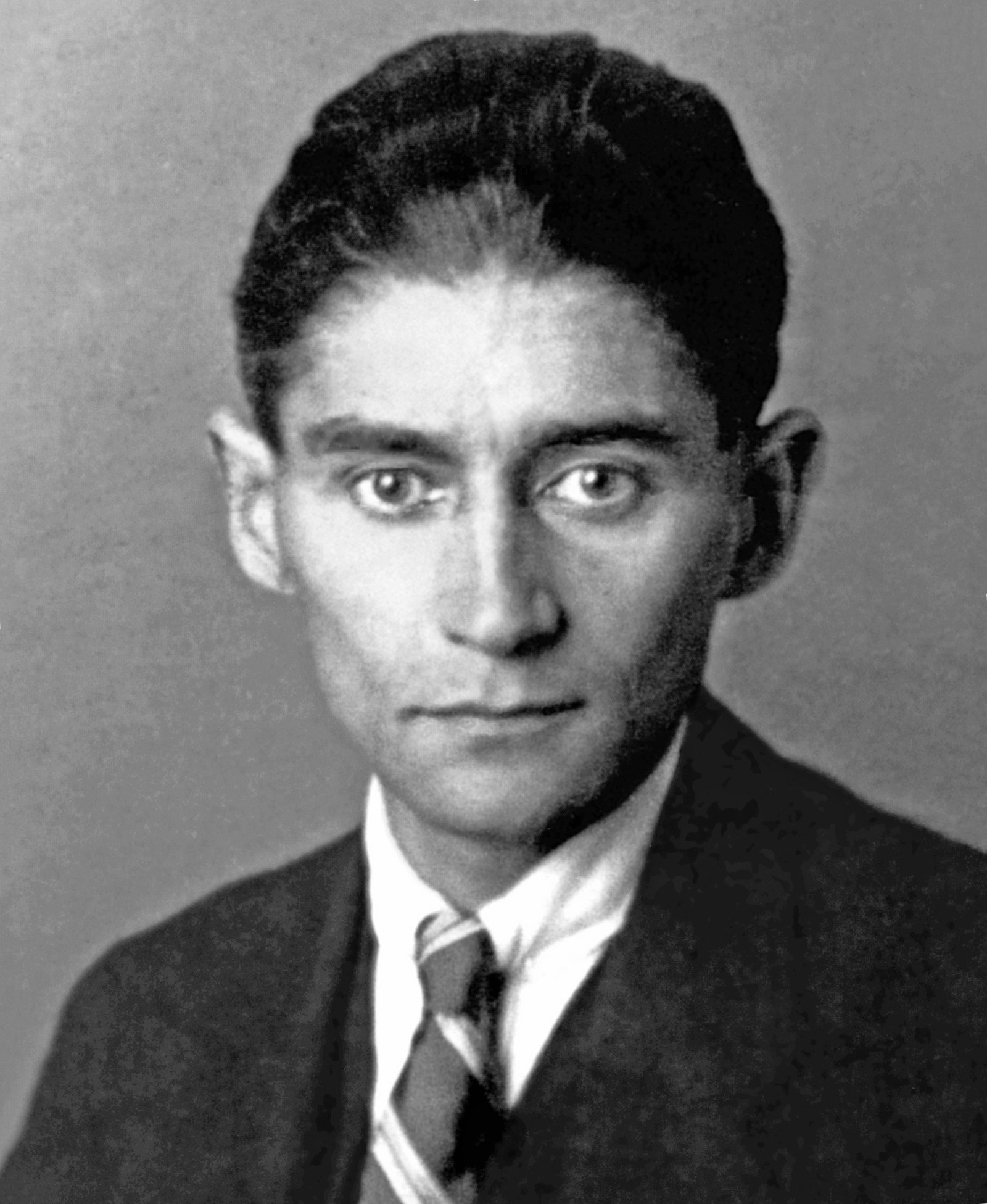 Franz Kafka (Franz Kafka: Pictures of a Life by Klaus Wagenbach (1984), p. 209 and Kafka Bildarchiv. Photographer not identified.
Exhibition Kafka: Making of an Icon, Morgan Library & Museum (PDF, page 25), Public domain)