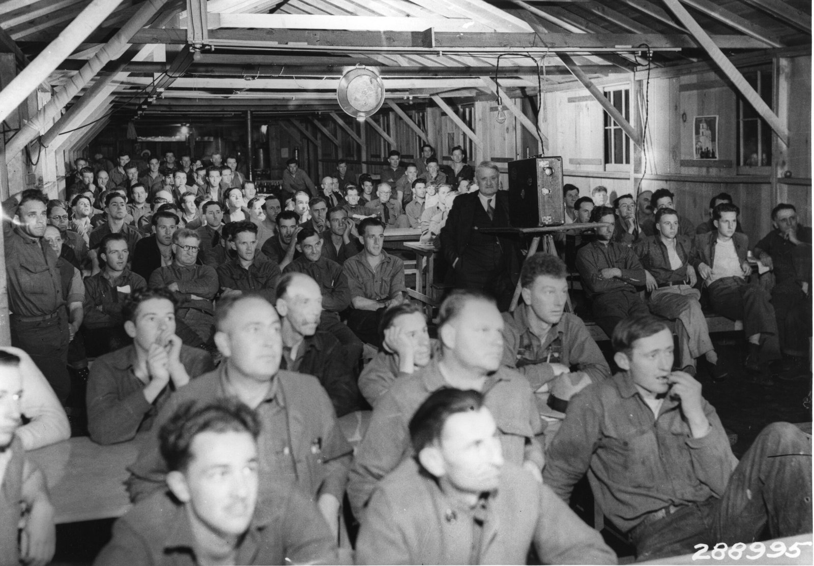 The Quiet Pull of the Overlooked (CCC enrollees watching a movie, No restrictions)