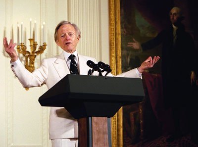 Tom Wolfe vs. Norman Mailer, John Updike, and John Irving: One Against Three (By White House Photo by Susan Sterner., Public domain)