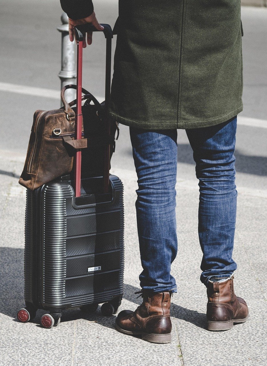 Wear Bulkiest Items on Travel Day (Image Credits: Pixabay)