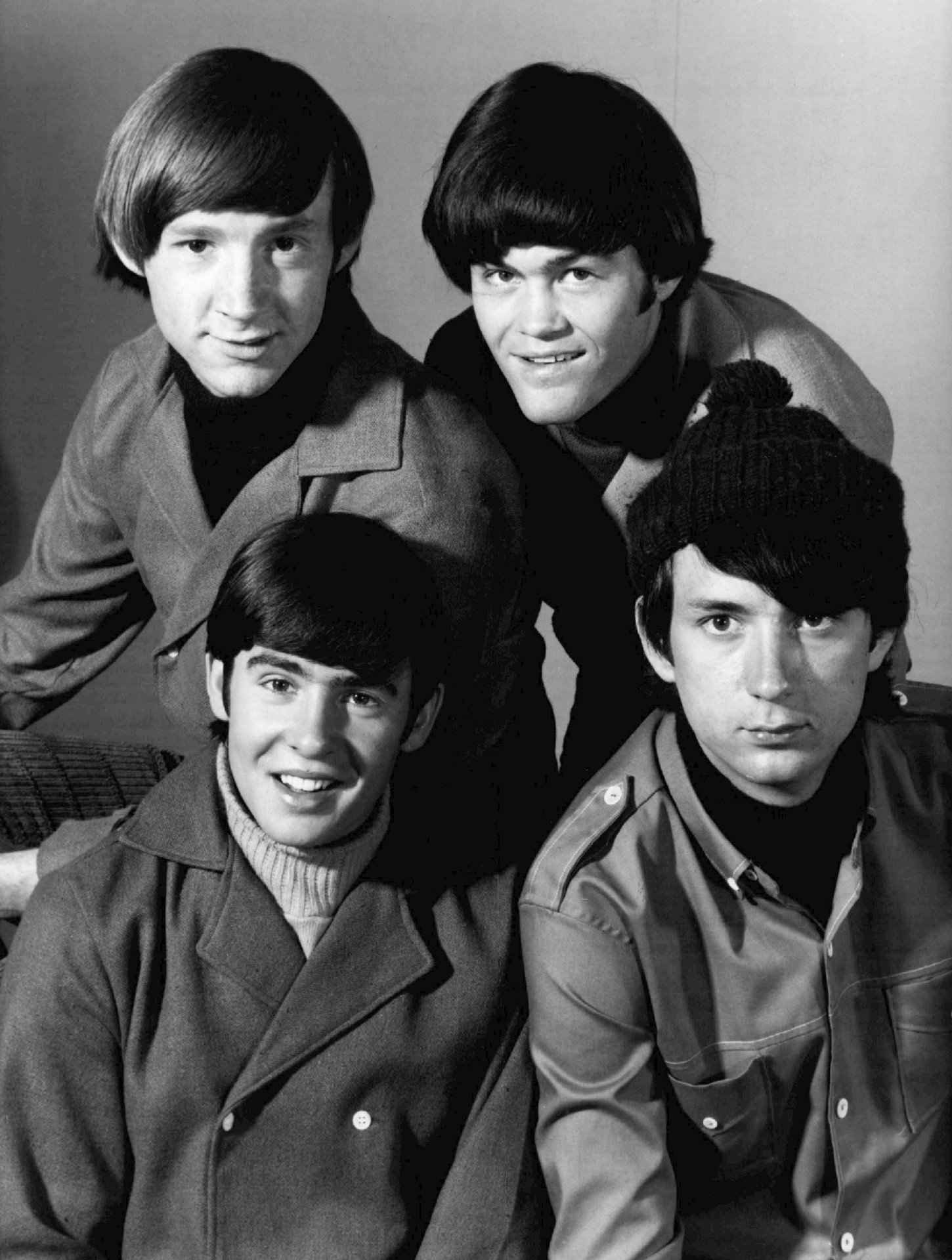 The Monkees (eBay
front
back
eBay
card front

card back, Public domain)