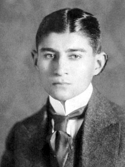 Franz Kafka (Franz Kafka: Pictures of a Life by Klaus Wagenbach (1984), p. 88–89. Authorship to the "photographic studio of Schlosser-Wenisch".
Kafka Bildarchiv. Photographer not identified.
According to the Geni page of Otto Schlosser, he opened the atelier Schlosser & Wenisch together with Max Wenisch (1876–?) in 1909, but there is no evidence that Max Wenisch took photographs., Public domain)